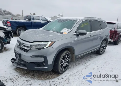 2019 Honda Pilot Touring z USA, uszkodzony, nr VIN 5FNYF6H62KB090155